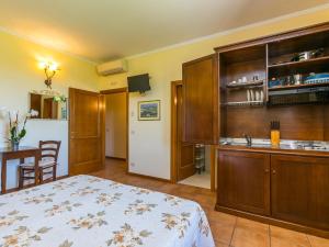A kitchen or kitchenette at Apartment Tipologia Mono-8 by Interhome