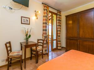 A bed or beds in a room at Apartment Tipologia Mono-8 by Interhome