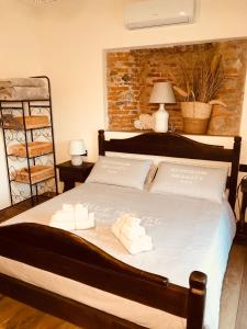 Postel nebo postele na pokoji v ubytování B&B Tenuta Legnate