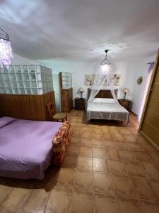 Postel nebo postele na pokoji v ubytování Suite Alhucema