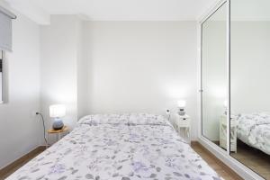 Krevet ili kreveti u jedinici u okviru objekta Home2Book Stylish Drago Apt Puerto de la Cruz