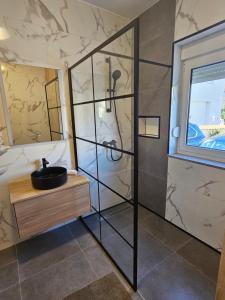 Koupelna v ubytování Apartmani Vuković