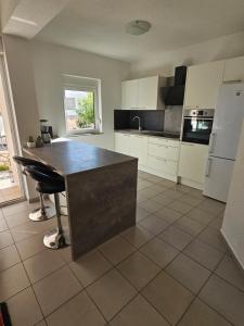 Kuchyň nebo kuchyňský kout v ubytování Apartmani Vuković