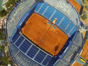 an overhead view of a tennis court in a stadium at App Forza in Umag
