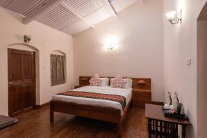 Postel nebo postele na pokoji v ubytování Ibex Resorts, Coonoor Leewood