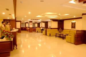 Členové personálu v ubytování Hotel Arcadia