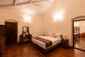 Postel nebo postele na pokoji v ubytování Ibex Resorts, Coonoor Leewood