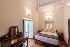 Postel nebo postele na pokoji v ubytování Ibex Resorts, Coonoor Leewood