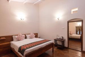 Postel nebo postele na pokoji v ubytování Ibex Resorts, Coonoor Leewood