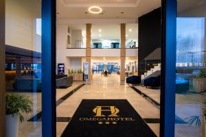 Posezení v ubytování Omega Hotel