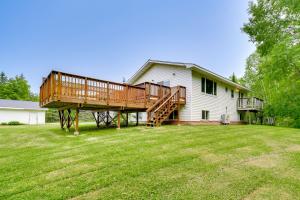 a house with a large deck on a yard at South Range Home - 6 Mi to Lake Superior! in South Range