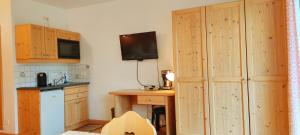 Kuchyň nebo kuchyňský kout v ubytování Pension Berghof