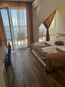 A bed or beds in a room at Villa Maria 2