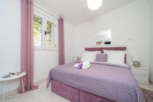 Postel nebo postele na pokoji v ubytování Apartment Santa