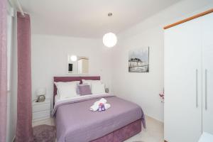Postel nebo postele na pokoji v ubytování Apartment Santa
