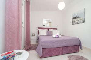 Postel nebo postele na pokoji v ubytování Apartment Santa