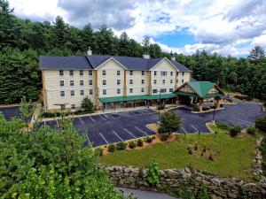 an aerial view of a hotel with a parking lot at Hampton Inn & Suites Cashiers - Sapphire Valley in Sapphire