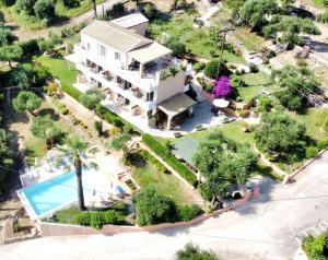 an aerial view of a house with a swimming pool at Veroniki Penthouse Deluxe Apartment in Agios Ioannis Peristerion