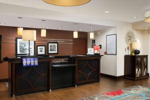 a lobby of a hotel with a reception desk at Hampton Inn & Suites Chicago Southland-Matteson in Matteson