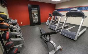 a gym with several tread machines in a room at Hampton Inn Lincolnton in Lincolnton