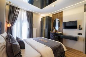 A bed or beds in a room at Wind Suit
