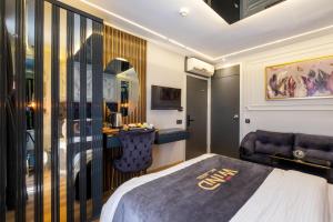 A bed or beds in a room at Wind Suit