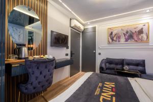 A bed or beds in a room at Wind Suit