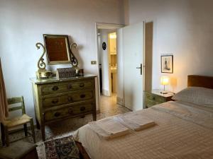 Letto o letti in una camera di Attico con terrazzo panoramico a 200 mt dal Duomo