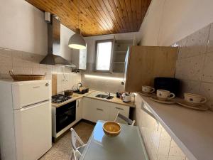Cucina o angolo cottura di Attico con terrazzo panoramico a 200 mt dal Duomo