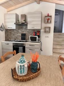 A cozinha ou kitchenette de Casa vacanze residenza del sole