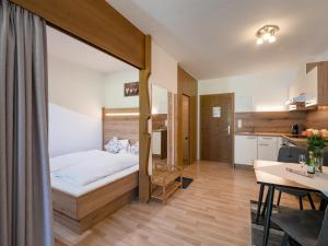 Posteľ alebo postele v izbe v ubytovaní Appartementhaus Montana KG