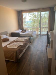 A bed or beds in a room at Villa Maria 2