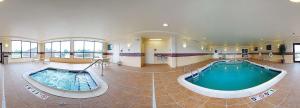 a large bathroom with a large swimming pool at Newly Renovated-Hampton Inn & Suites Casper in Casper