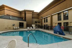 a large swimming pool in front of a hotel at Hampton Inn Caryville-I-75/Cove Lake-State Park in Caryville