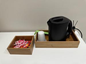 Příslušenství pro přípravu čaje a kávy v ubytování Residenza esposito