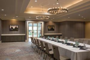 a large conference room with a long table and chairs at DoubleTree by Hilton Hotel Dallas - Love Field in Dallas