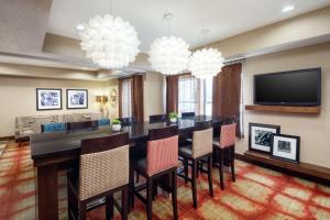 a dining room with a large table and chairs at Hampton Inn Dayton Fairborn Wright Patterson AFB in Fairborn