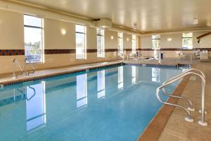 a large swimming pool in a hotel room at Hampton Inn Dubuque in Dubuque