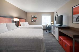Postel nebo postele na pokoji v ubytování Hampton Inn Denver-West/Golden