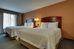 Postel nebo postele na pokoji v ubytování Hampton Inn & Suites Denver Littleton