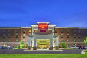 a hotel with a sign that reads chiropractor village at Hampton Inn Detroit - Shelby Township in Shelby