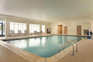 a large swimming pool in a hotel room at Homewood Suites by Hilton Detroit-Troy in Birmingham