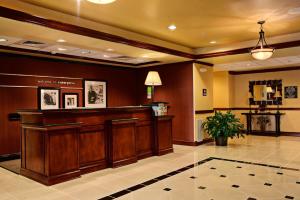 a waiting room with a reception desk in a lobby at Hampton Inn Enterprise in Enterprise +20 photos