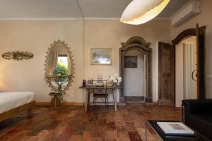 A bed or beds in a room at La Cucchetta