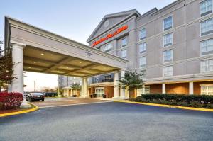 a rendering of a hotel with a parking lot at Hampton Inn and Suites Fredericksburg in Fredericksburg