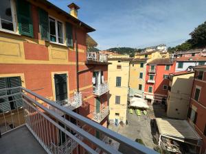 a view of a city from the balcony of a building at Delizioso bilocale Mottino23 in Lerici