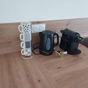 Příslušenství pro přípravu čaje a kávy v ubytování Bel appartement F2 hyper centre refait à neuf