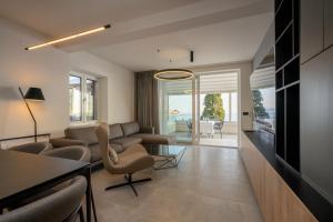 a living room with a couch and a table at Levanat in Dubrovnik