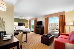 TV a/nebo společenská místnost v ubytování Homewood Suites by Hilton Fort Worth West at Cityview