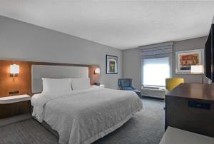 Postel nebo postele na pokoji v ubytování Hampton Inn Gallatin